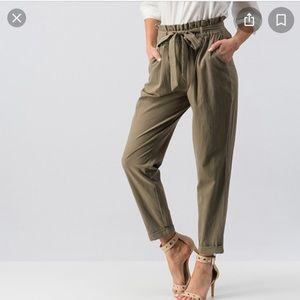 Olive green waist tie trousers.